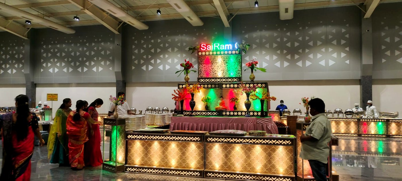 Illuminated SaiRam live counter at an indoor event